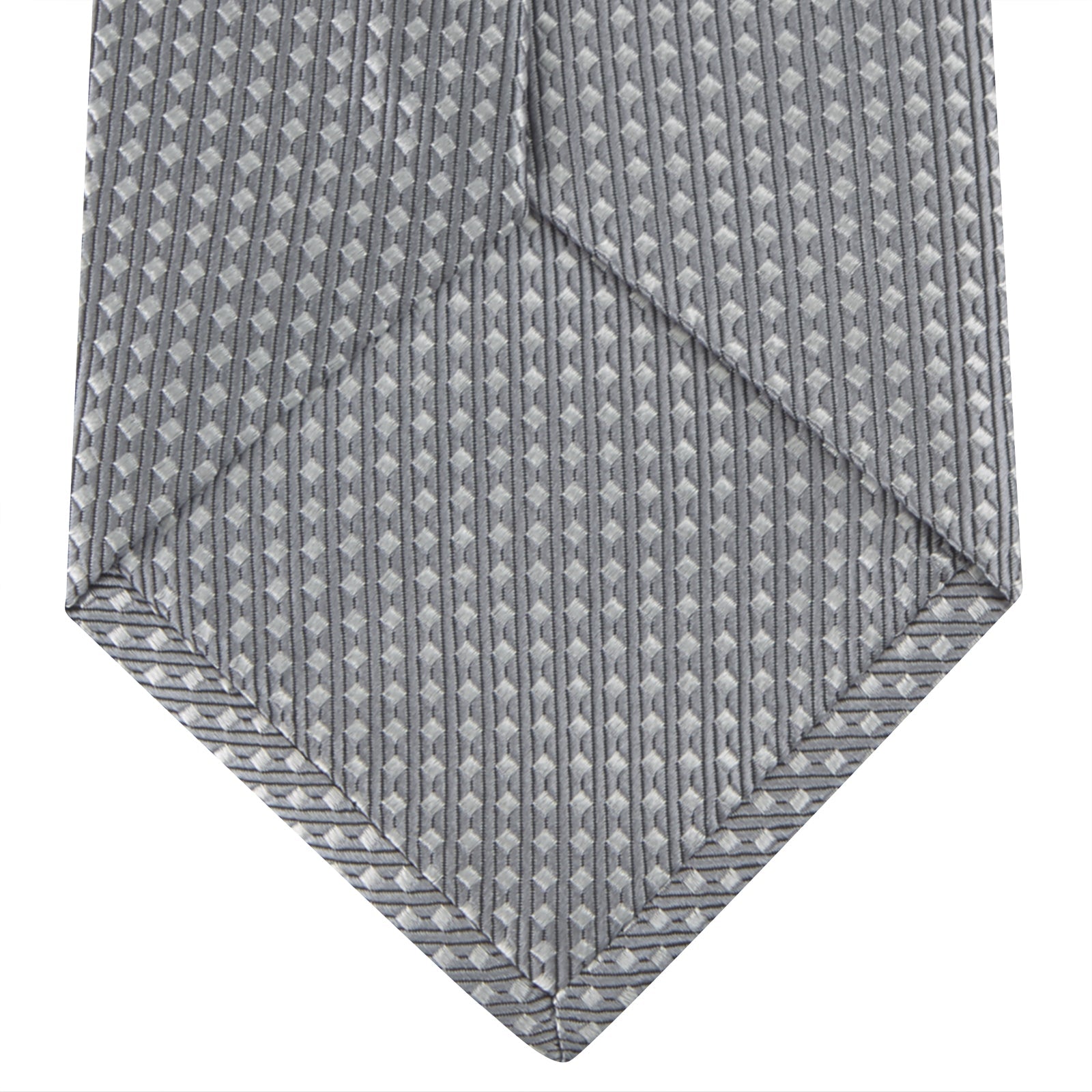 View 4 of product The Turnbull & Asser Grey and White Diamond Silk Tie, featuring a subtle textured pattern, is perfect for pairing with an office shirt and is displayed against a white background.