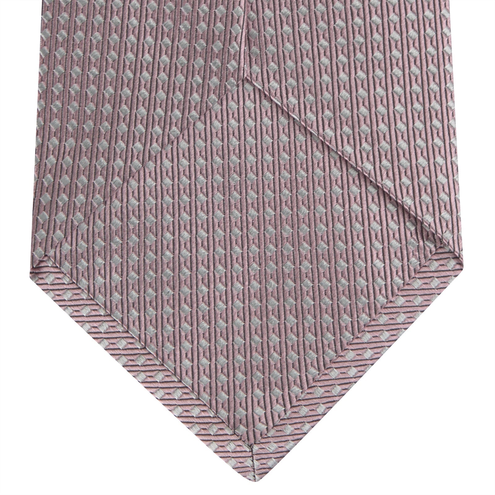 View 4 of product The Turnbull & Asser Rose and White Diamond Silk Tie, shown rolled on a white background, features a subtle diamond pattern—an elegant accessory to elevate any office shirt.