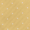 View 3 of product The Turnbull & Asser Gold and White Small Spot Herringbone Silk Tie is crafted from fine English silk, featuring a gold herringbone weave with white polka dots, and is shown rolled up on a white background.