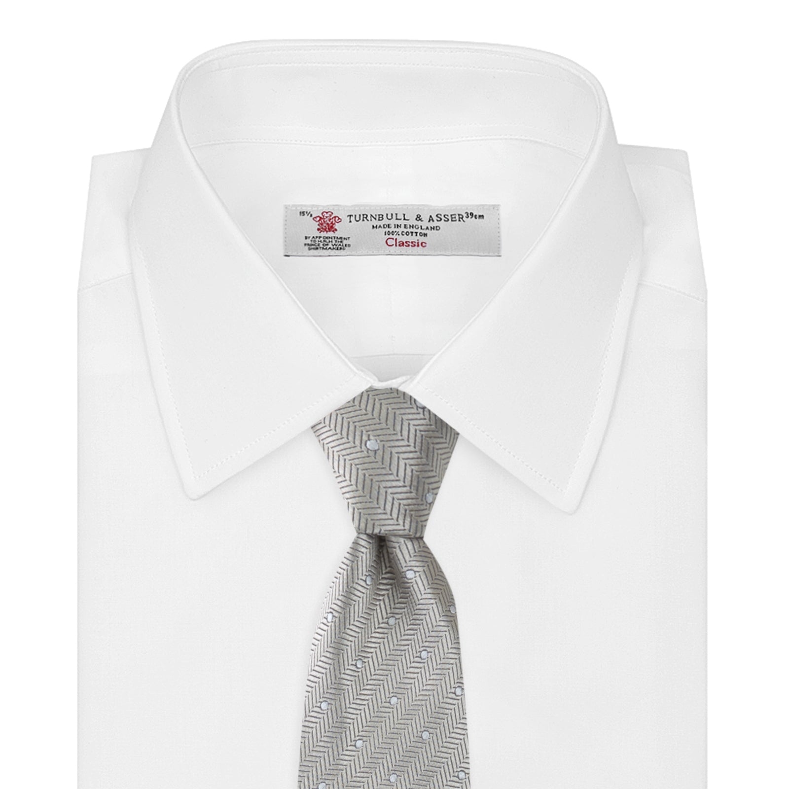 View 2 of product The Turnbull & Asser Silver and White Small Spot Herringbone Silk Tie features a subtle pattern of small, evenly spaced light dots and is expertly crafted from fine English silk.