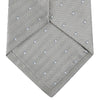 View 4 of product The Turnbull & Asser Silver and White Small Spot Herringbone Silk Tie features a subtle pattern of small, evenly spaced light dots and is expertly crafted from fine English silk.