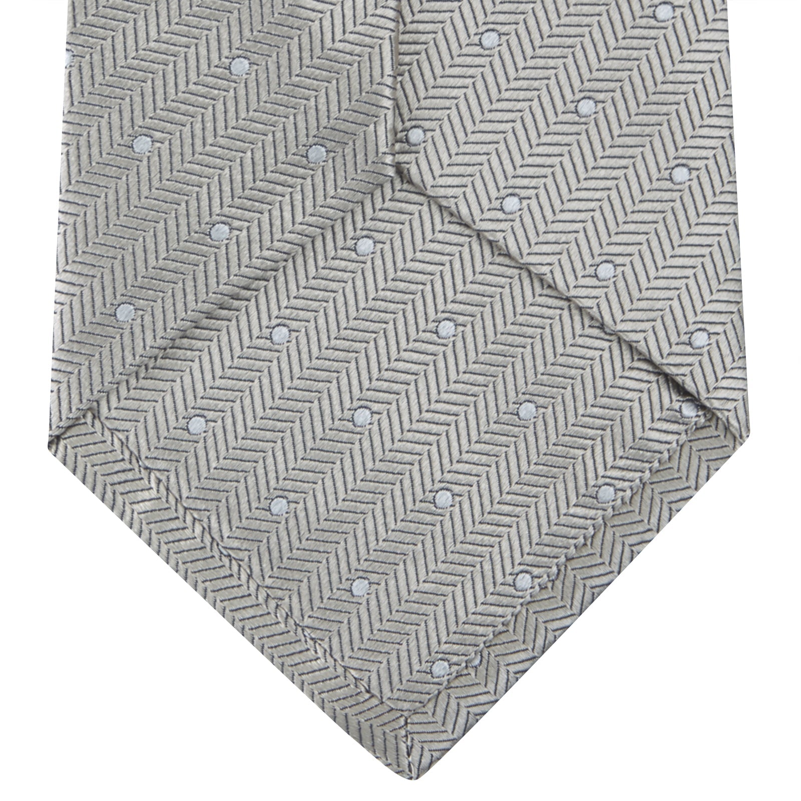 View 4 of product The Turnbull & Asser Silver and White Small Spot Herringbone Silk Tie features a subtle pattern of small, evenly spaced light dots and is expertly crafted from fine English silk.