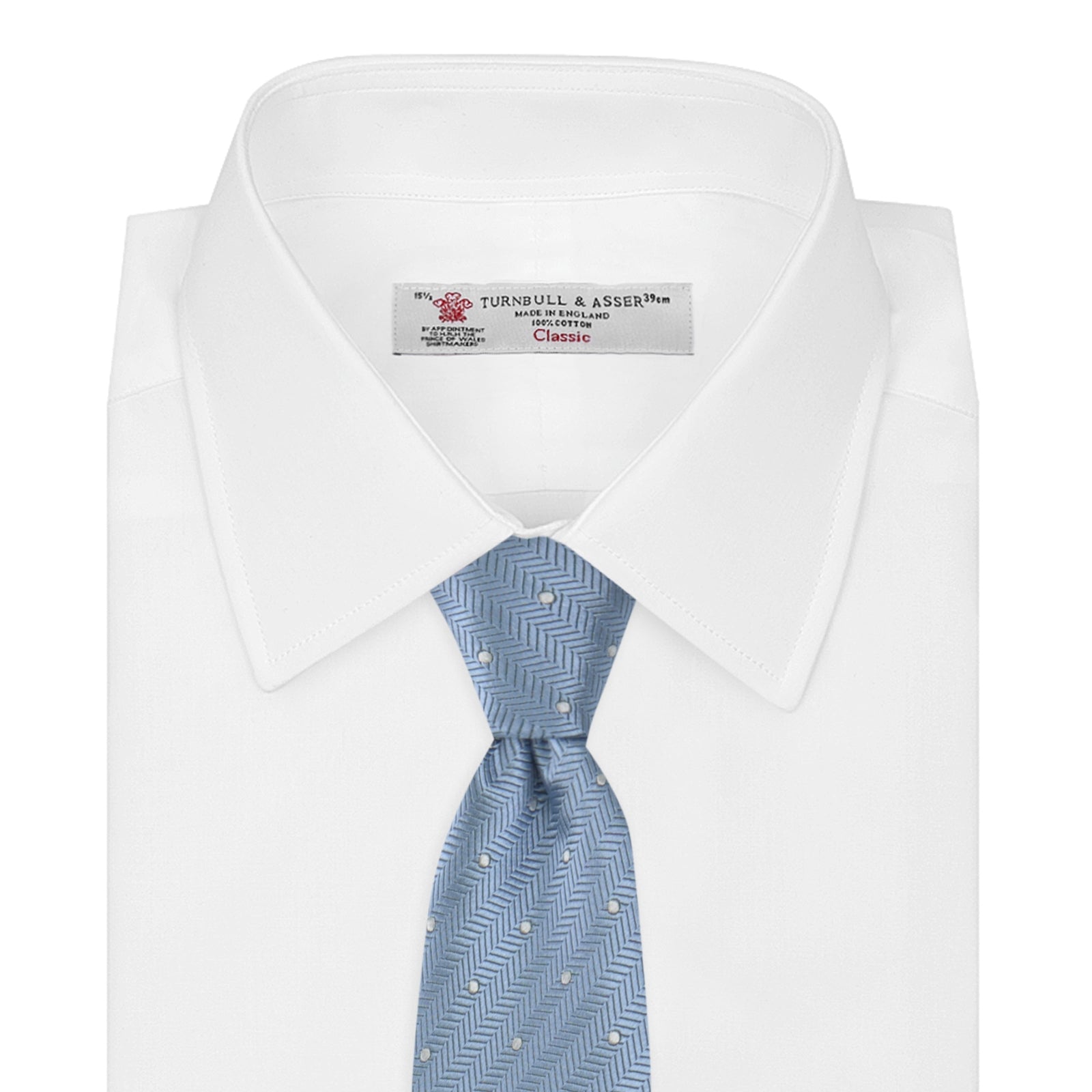 View 2 of product The Turnbull & Asser Ice Blue and White Small Spot Herringbone Silk Tie features a refined herringbone weave with subtle white spots, displayed elegantly against a plain white background.