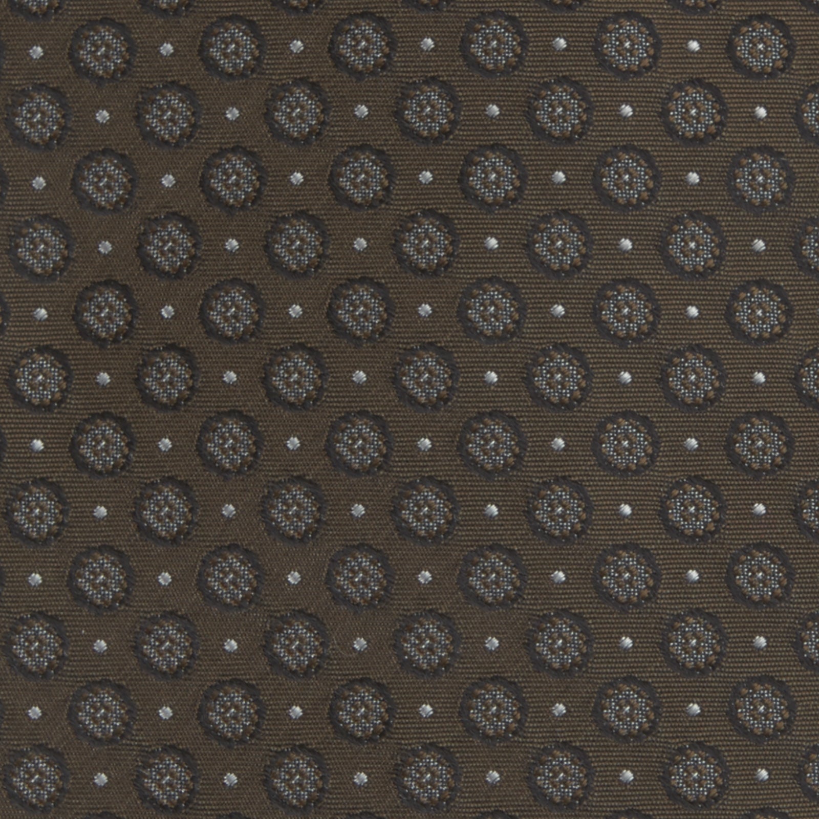 View 3 of product The Brown Floral Spot Silk Tie by Turnbull & Asser features a classic brown base with silver-gray floral spots—an elegant accessory that pairs perfectly with your office shirts.