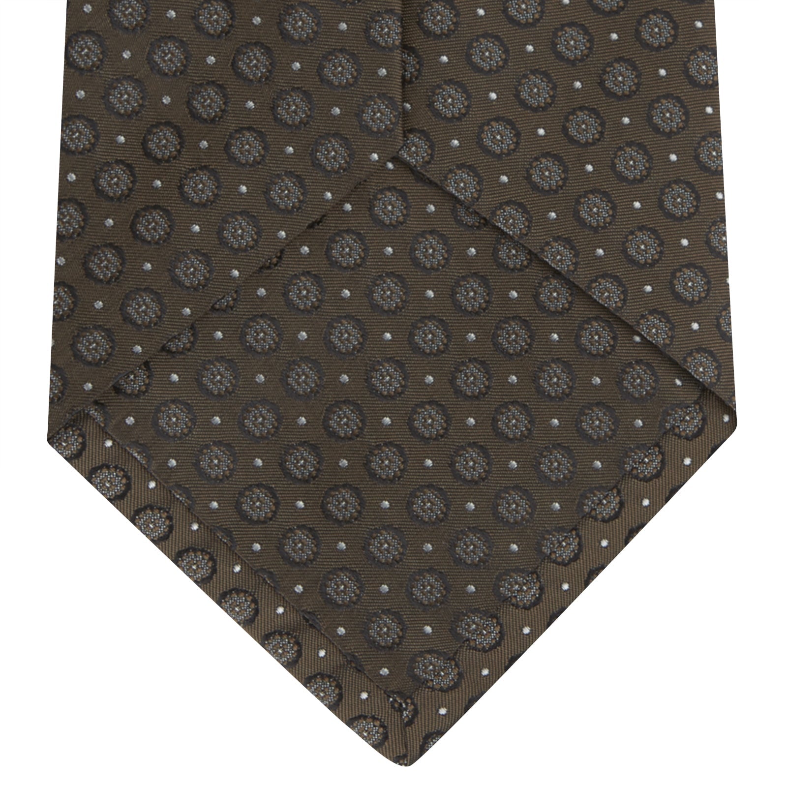 View 4 of product The Brown Floral Spot Silk Tie by Turnbull & Asser features a classic brown base with silver-gray floral spots—an elegant accessory that pairs perfectly with your office shirts.