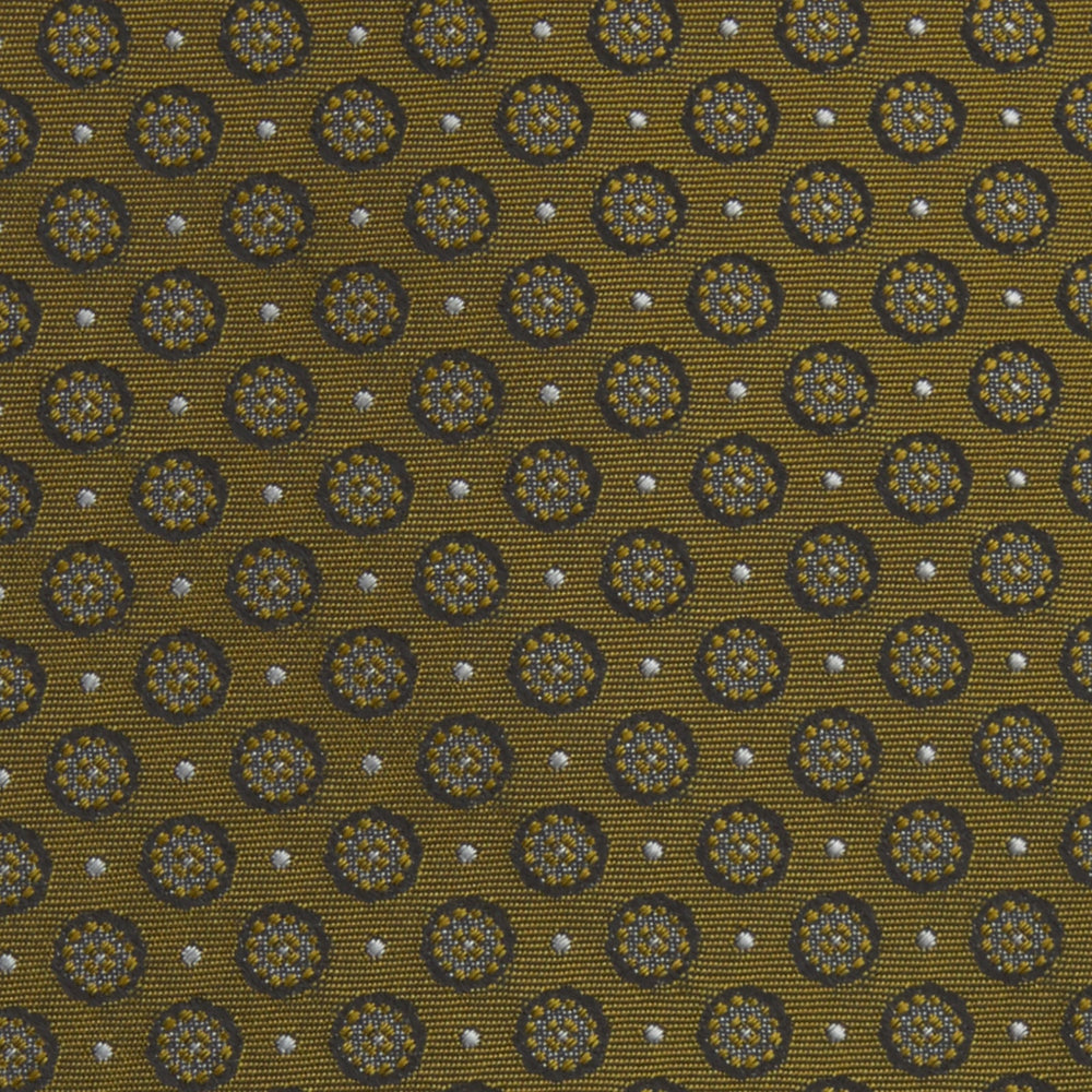 The Gold Floral Spot Silk Tie by Turnbull & Asser showcases a rolled-up design in olive green silk with light floral spots, perfect for adding a refined touch to any office shirt and standing out against a plain white background.