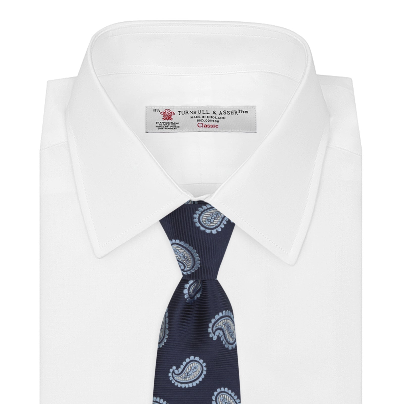 View 2 of product The Turnbull & Asser Navy and Light Blue Floating Paisley Silk Tie features a repeating light blue and white paisley pattern set against a navy blue silk backdrop.