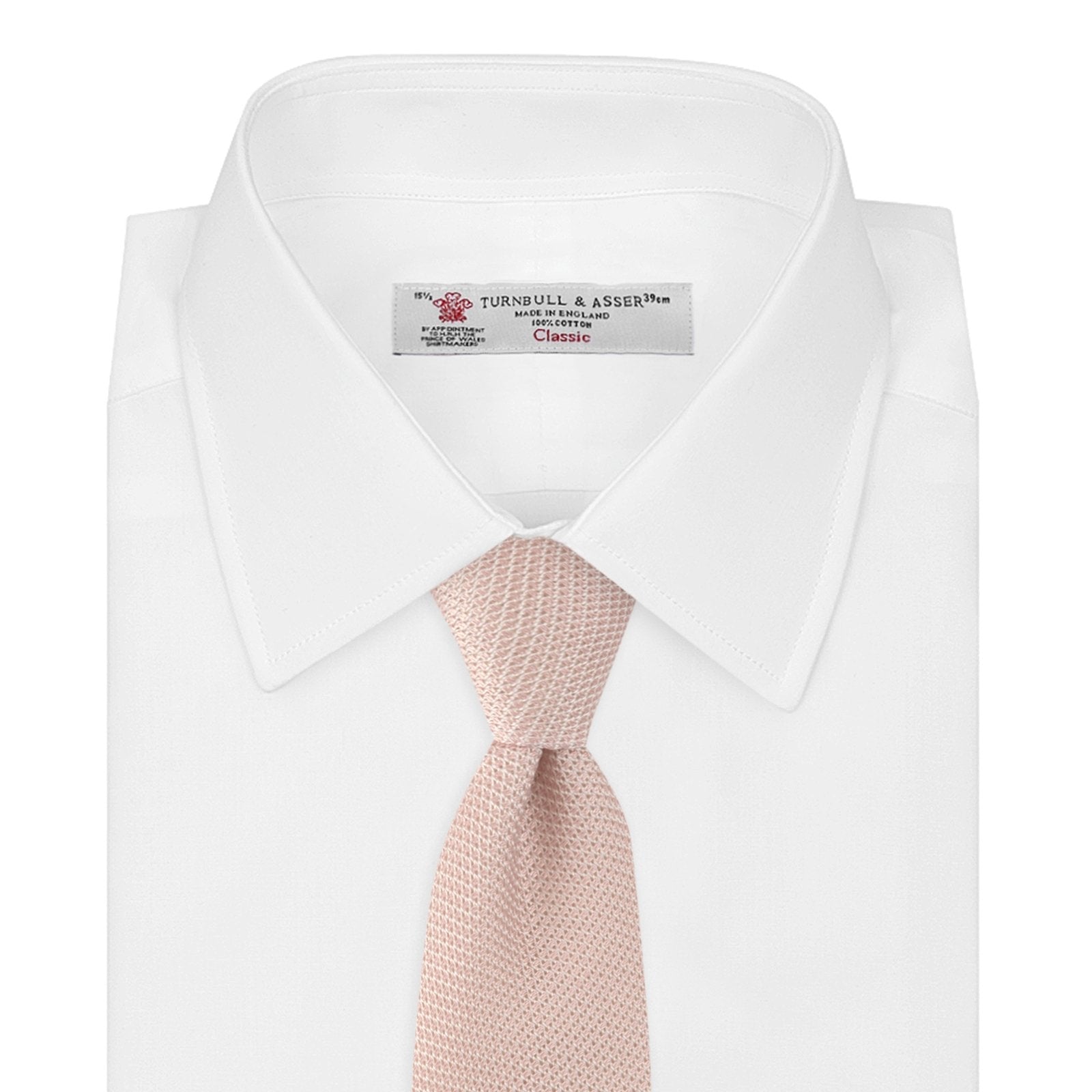 View 2 of product The Turnbull & Asser Light Pink Grenadine Silk Tie features a subtle woven pattern, shown rolled up on a plain white background.