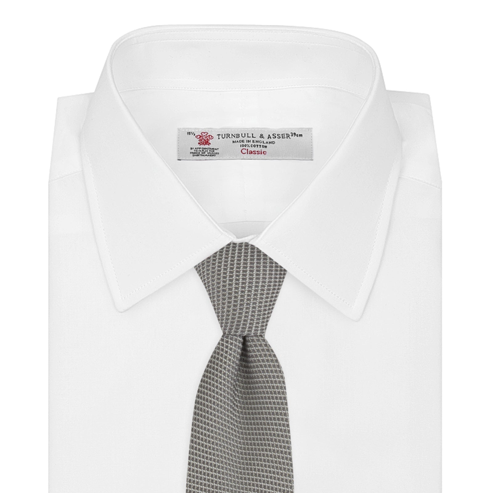 View 2 of product The Turnbull & Asser Light Grey Grenadine Silk Tie features a finely textured checkered pattern and superb dimensional stability, shown rolled up against a plain white background.