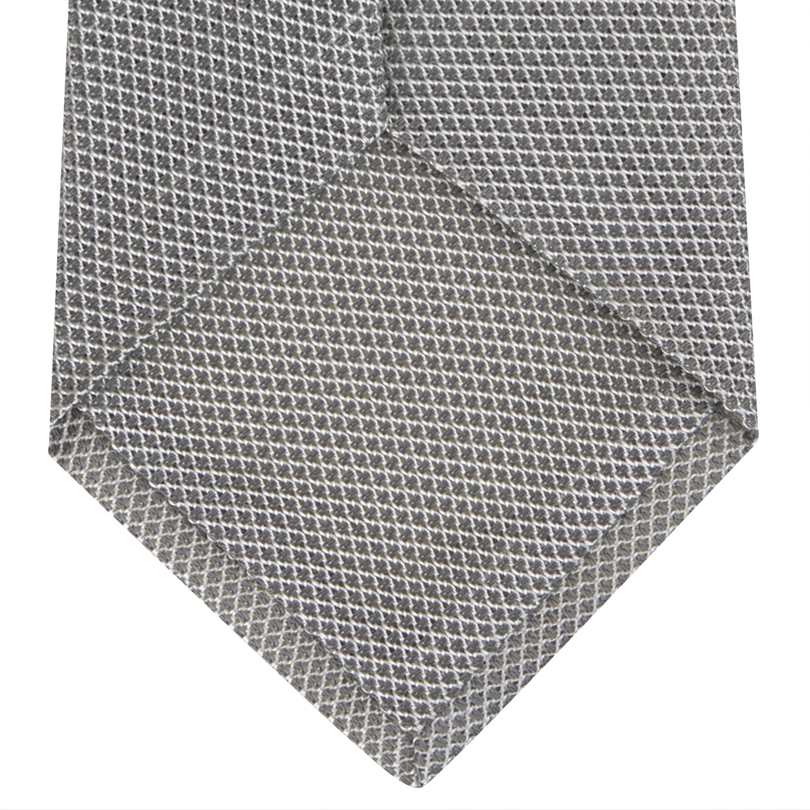 View 4 of product The Turnbull & Asser Light Grey Grenadine Silk Tie features a finely textured checkered pattern and superb dimensional stability, shown rolled up against a plain white background.