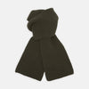 View 1 of product The Turnbull & Asser Khaki Green Knitted Cashmere Scarf is laid flat with one end looped through the other, showcasing its thick, cozy texture—an ideal winter accessory.