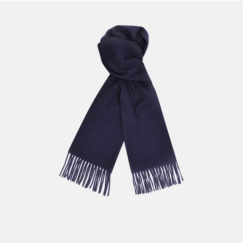 View 1 of product The Turnbull & Asser Navy Pure Cashmere Scarf, featuring fringed ends, is neatly folded and displayed on a plain white background—the perfect winter accessory.
