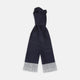 The Turnbull & Asser Navy and White Spotted Silk Scarf with Fringes, featuring small polka dots and grey fringe at both ends, is neatly folded and displayed on a plain white background.