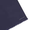 View 2 of product A Plain Navy Silk Scarf by Turnbull & Asser, neatly folded with both ends hanging down, is shown against a white background. One end displays subtle white branding, highlighting this elegant accessory.