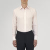 View 2 of product The Turnbull & Asser Pink Cashmere Blend Shirt features a T&A collar and 3-button cuffs, neatly folded with white buttons, displayed on a plain white background.
