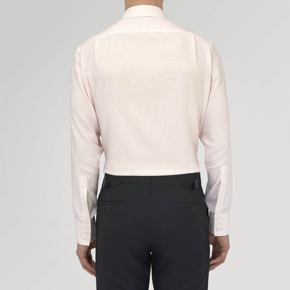 The Turnbull & Asser Pink Cashmere Blend Shirt features a T&A collar and 3-button cuffs, neatly folded with white buttons, displayed on a plain white background.