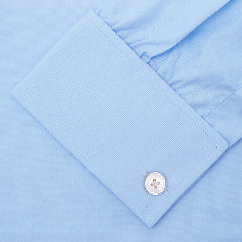 A Light Blue Cotton Shirt with T&A Collar and Double Cuffs by Turnbull & Asser, neatly folded and displayed on a plain white background.