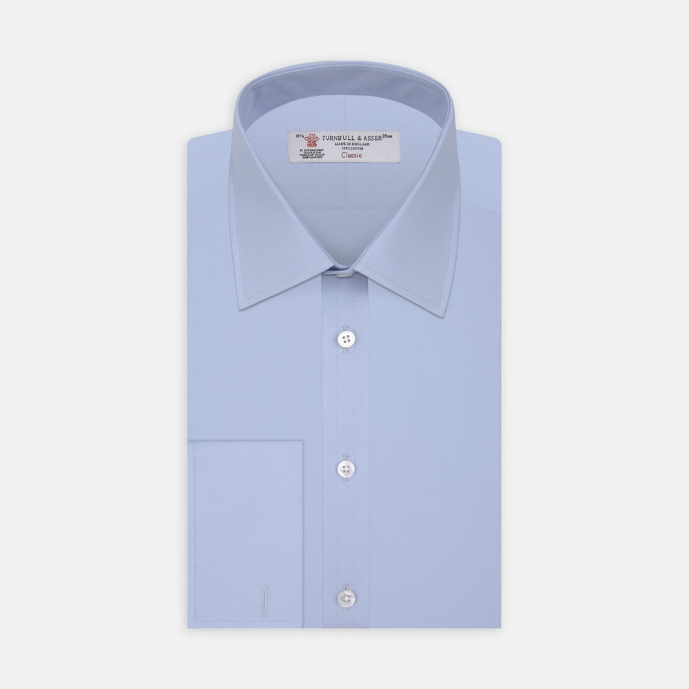 A Light Blue Cotton Shirt with T&A Collar and Double Cuffs by Turnbull & Asser, neatly folded and displayed on a plain white background.