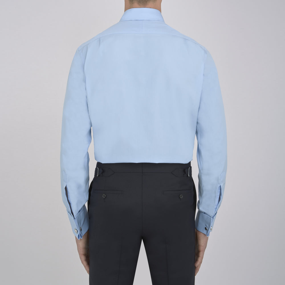 A Light Blue Cotton Shirt with T&A Collar and Double Cuffs by Turnbull & Asser, neatly folded and displayed on a plain white background.