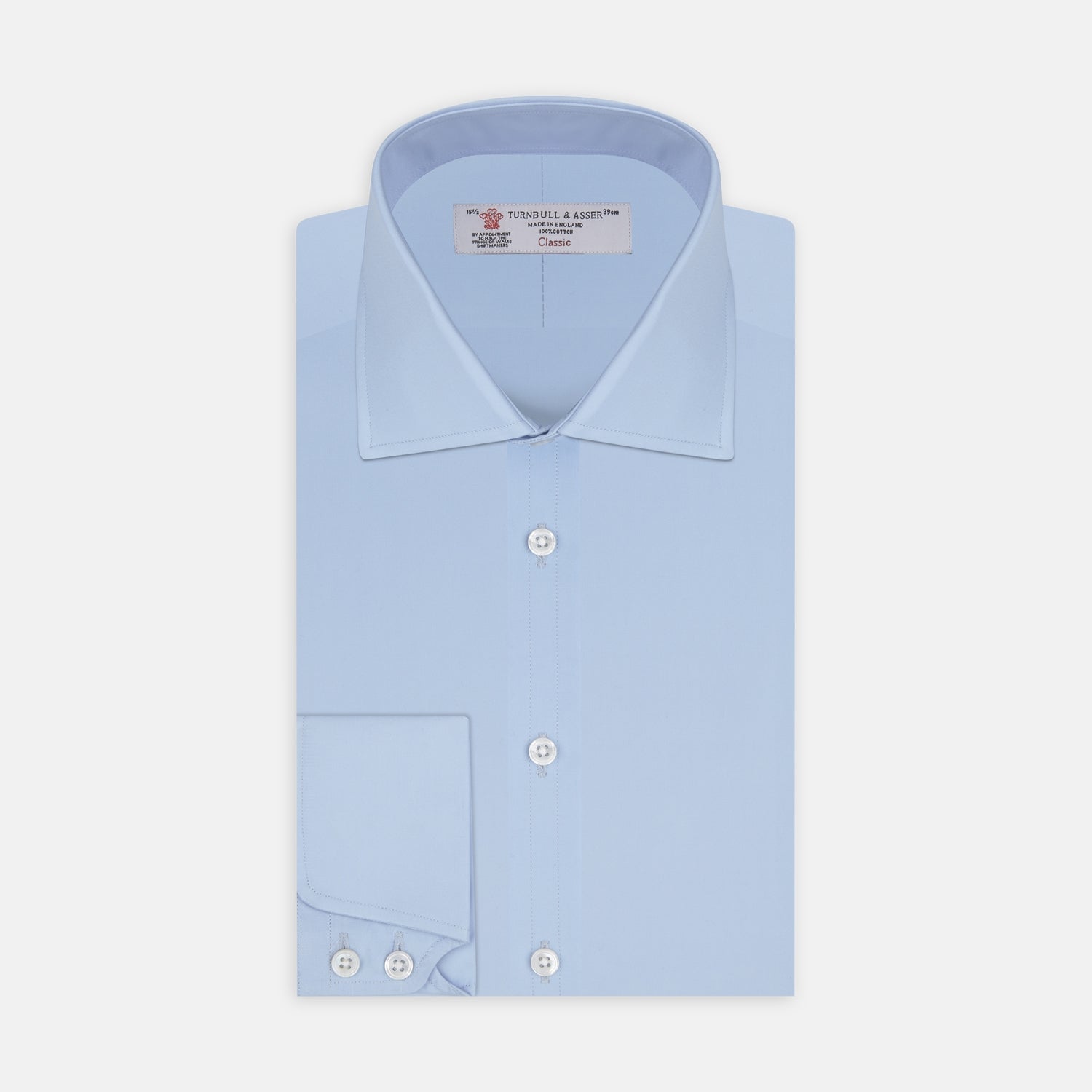 View 1 of product A Turnbull & Asser Blue Shirt with Regent Collar and 2-Button Cocktail Cuffs is neatly folded, featuring white buttons, and displayed on a plain white background.
