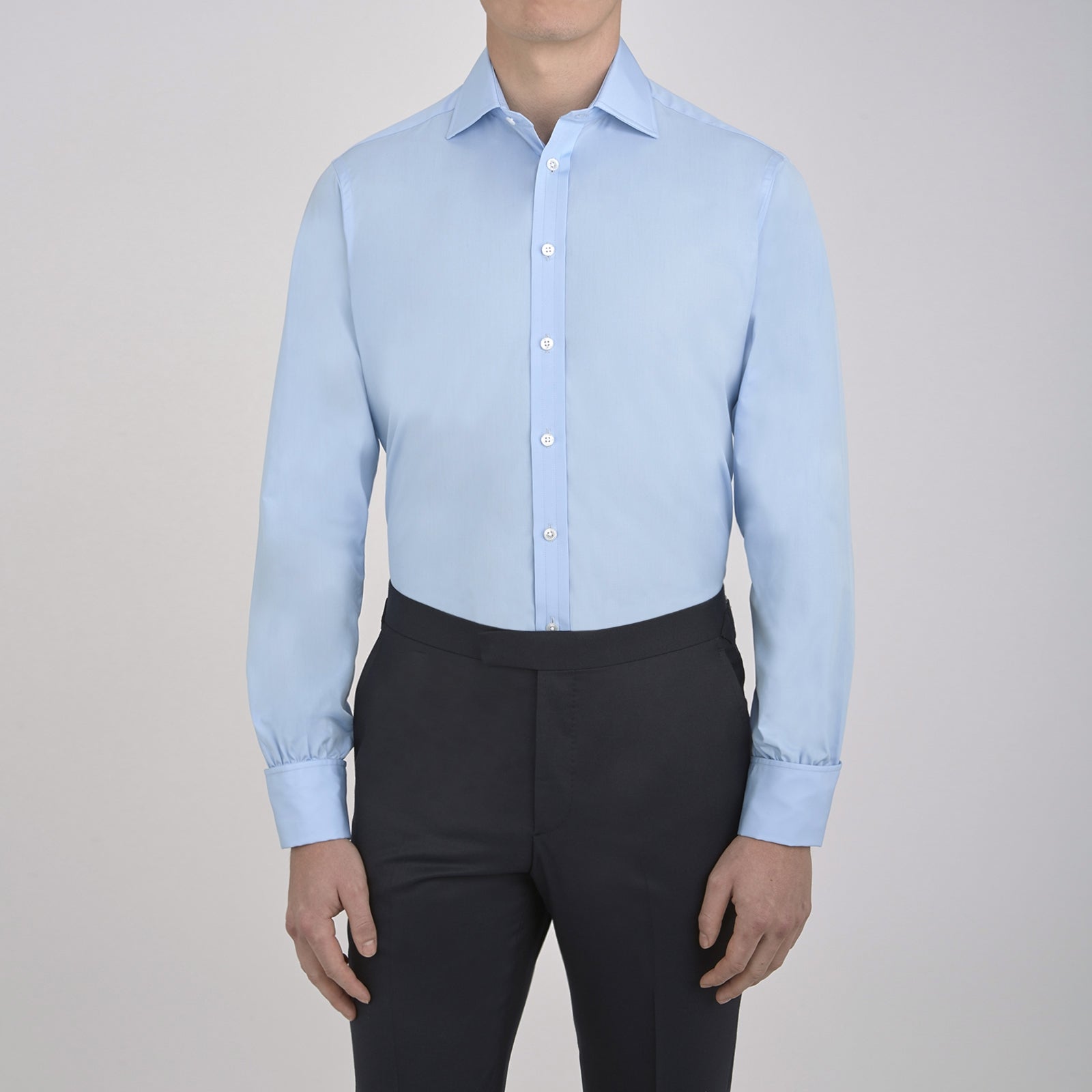 View 2 of product A Turnbull & Asser Blue Shirt with Regent Collar and 2-Button Cocktail Cuffs is neatly folded, featuring white buttons, and displayed on a plain white background.