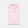 View 1 of product The Turnbull & Asser Pink End-on-End Shirt features a T&A collar, 3-button cuffs, and white buttons—a refined choice for any smart look—shown neatly folded against a plain white background.