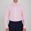 View 2 of product The Turnbull & Asser Pink End-on-End Shirt features a T&A collar, 3-button cuffs, and white buttons—a refined choice for any smart look—shown neatly folded against a plain white background.