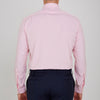 View 3 of product The Turnbull & Asser Pink End-on-End Shirt features a T&A collar, 3-button cuffs, and white buttons—a refined choice for any smart look—shown neatly folded against a plain white background.