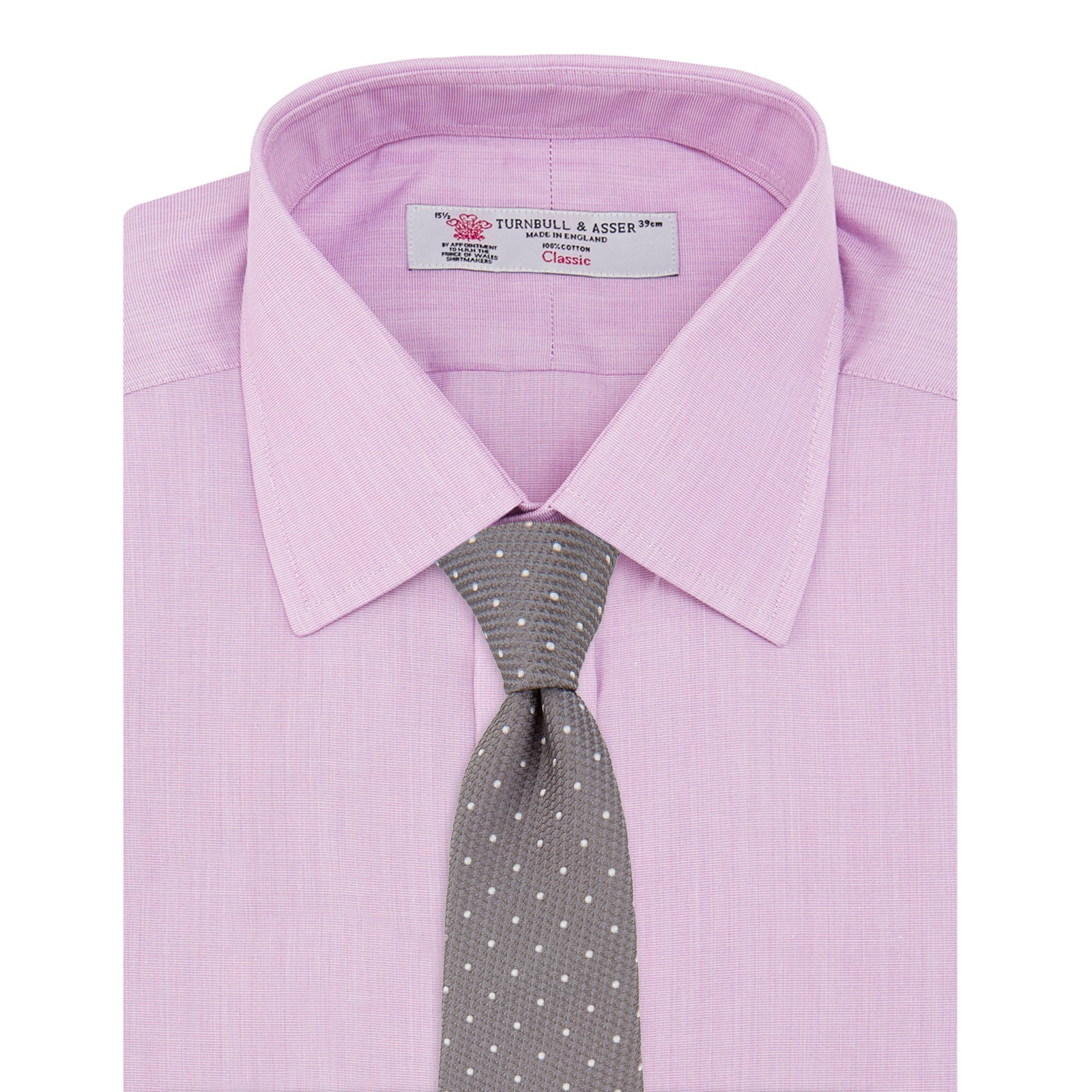 View 4 of product The Turnbull & Asser Lilac End-on-End Shirt features a T&A collar, double cuffs, and white buttons. Crafted from Italian two-tone cloth, this long-sleeved shirt is neatly folded and displayed on a plain white background.