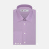 View 1 of product A neatly folded Turnbull & Asser Lilac End-on-End Shirt with T&A collar and 3-button cuffs, featuring white buttons and long sleeves, is displayed on a plain white background.