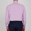 View 3 of product The Turnbull & Asser Lilac End-on-End Shirt features a T&A collar, double cuffs, and white buttons. Crafted from Italian two-tone cloth, this long-sleeved shirt is neatly folded and displayed on a plain white background.