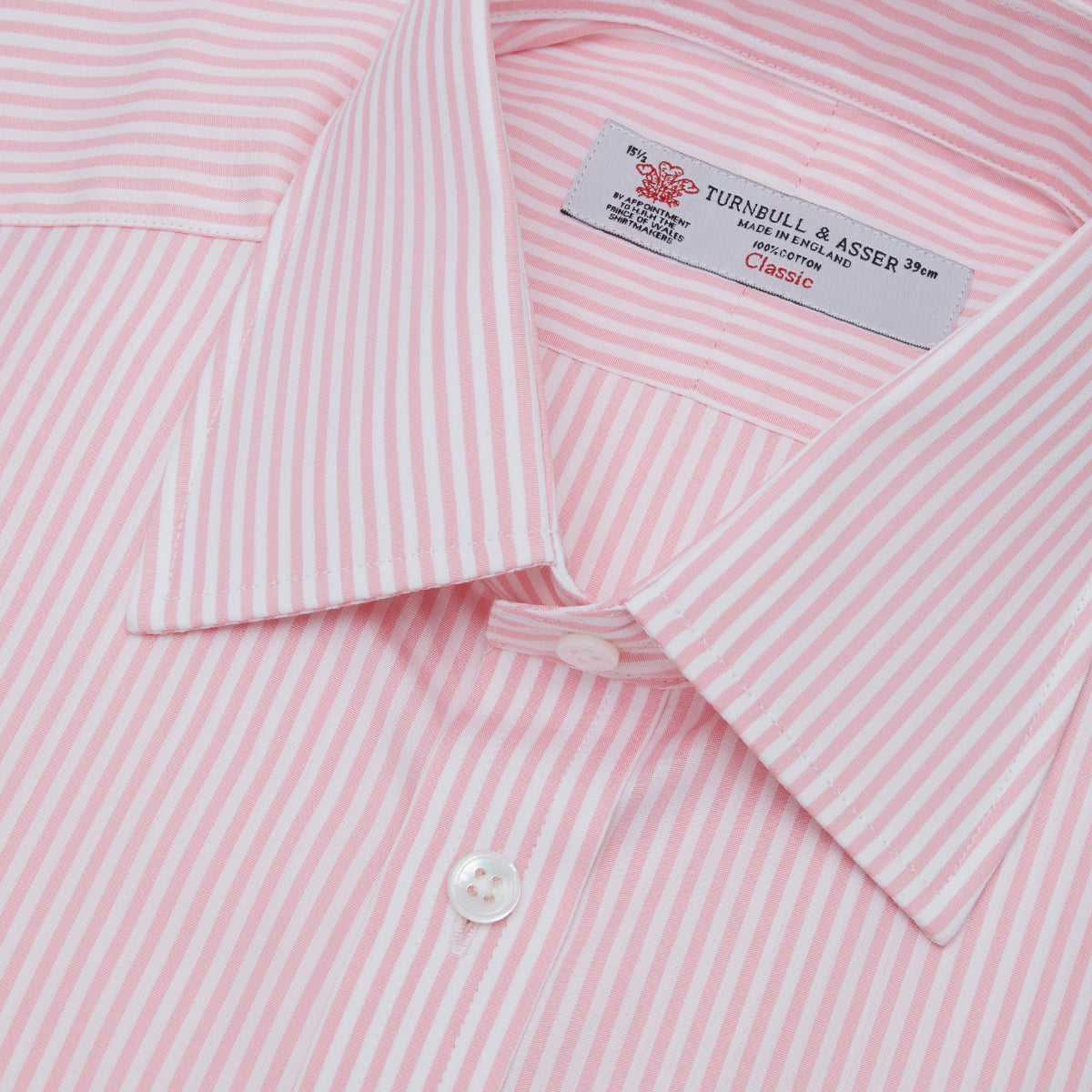 View 5 of product A neatly folded Turnbull & Asser blue shirt with a regent collar and 2-button cocktail cuffs, displayed against a plain white background.