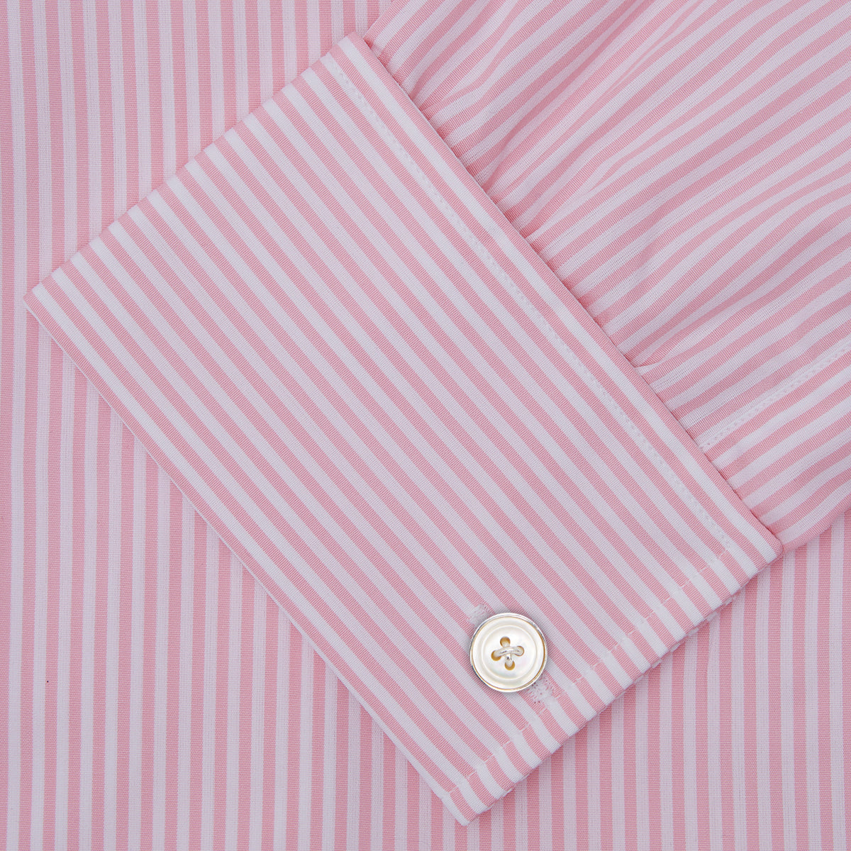 View 6 of product A neatly folded Turnbull & Asser blue shirt with a regent collar and 2-button cocktail cuffs, displayed against a plain white background.