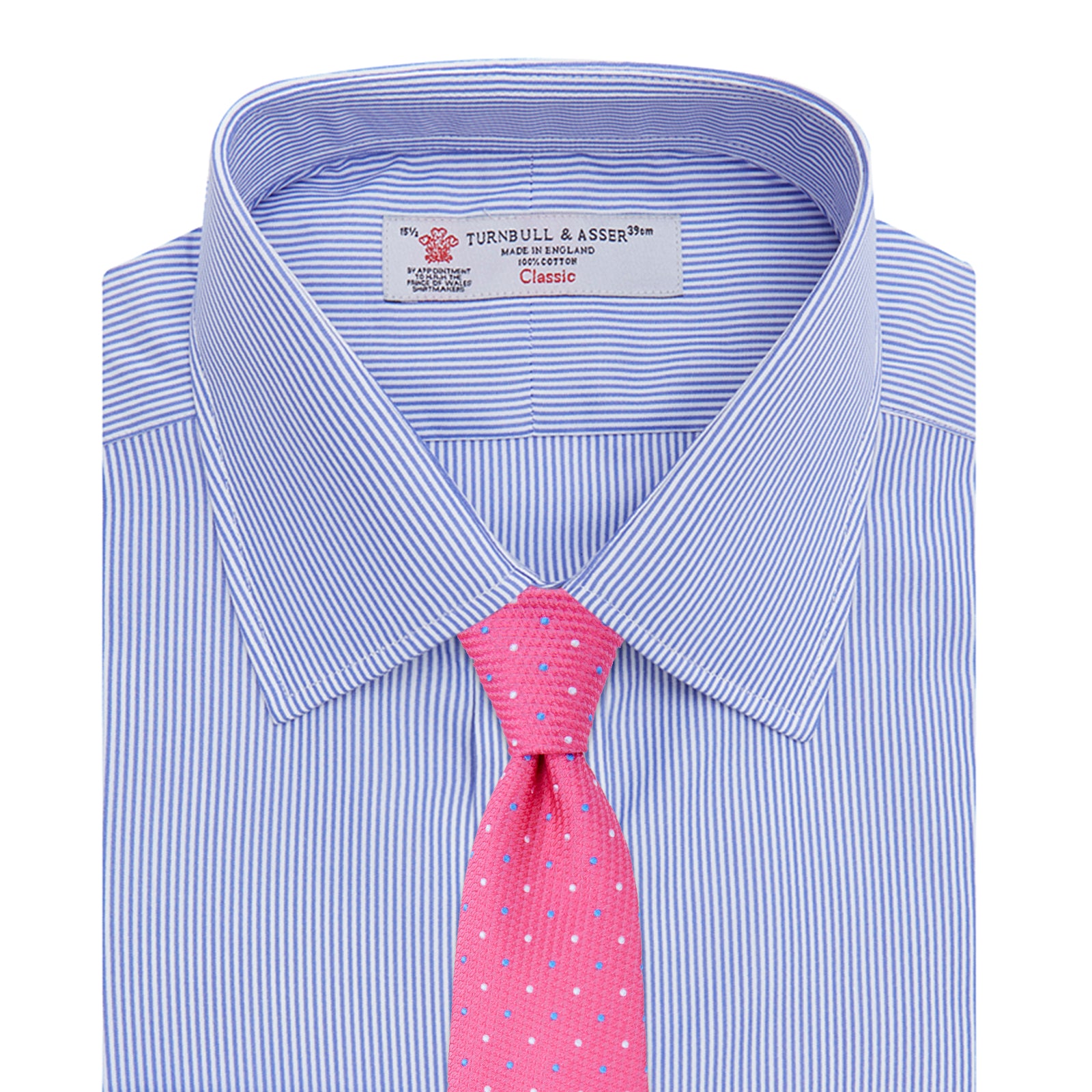 View 4 of product The Turnbull & Asser Blue Fine Bengal Stripe Shirt features a T&A collar, double cuffs, and white buttons, neatly folded and displayed against a plain white background.