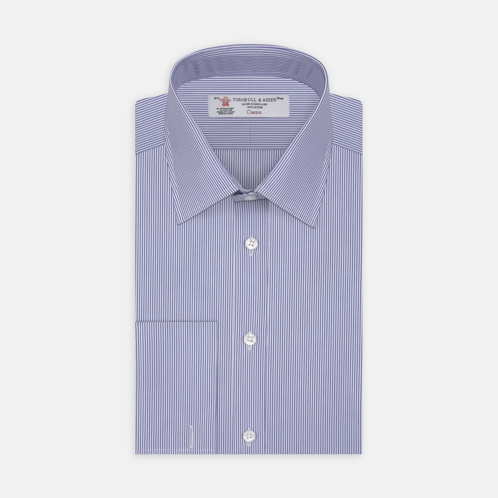 The Turnbull & Asser Blue Fine Bengal Stripe Shirt features a T&A collar, double cuffs, and white buttons, neatly folded and displayed against a plain white background.