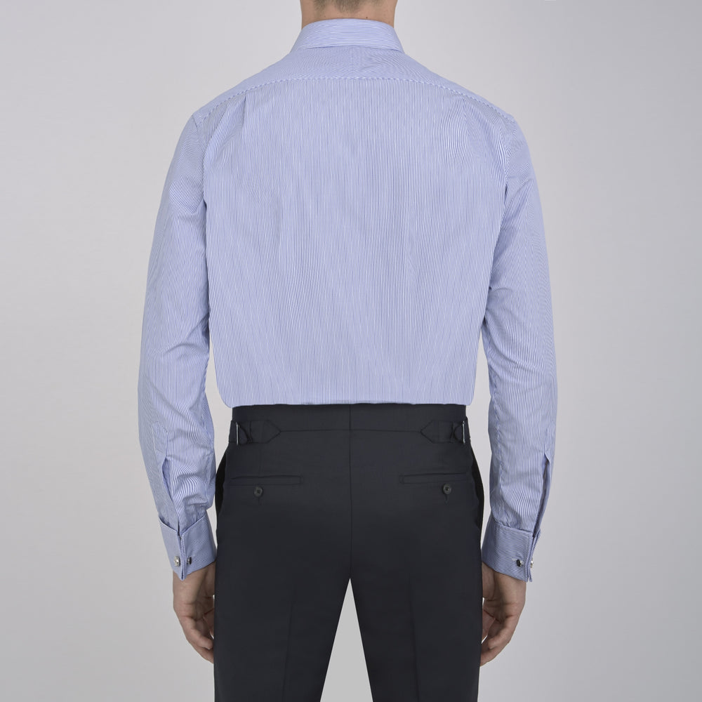 The Turnbull & Asser Blue Fine Bengal Stripe Shirt features a T&A collar, double cuffs, and white buttons, neatly folded and displayed against a plain white background.