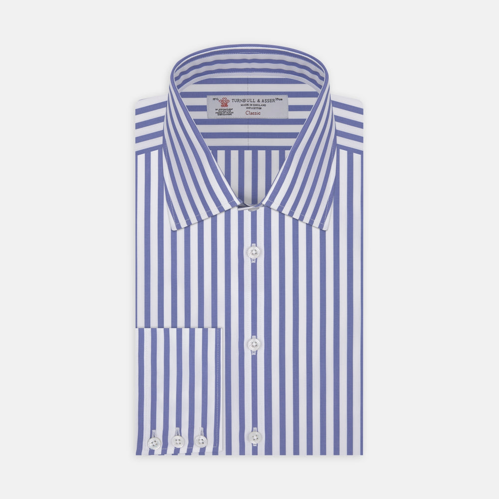 The Turnbull & Asser Blue and White Candy Stripe Shirt features a T&A collar, 3-button cuffs, and crisp white buttons, displayed neatly folded against a white background for a classic look.
