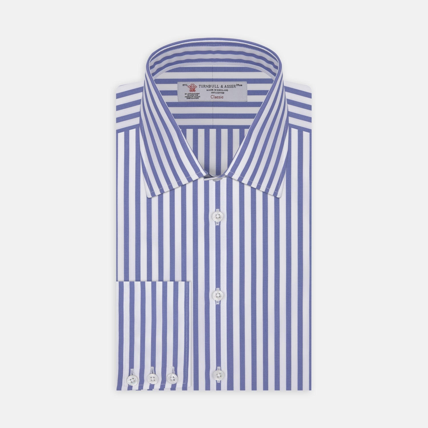 View 1 of product The Turnbull & Asser Blue and White Candy Stripe Shirt features a T&A collar, 3-button cuffs, and crisp white buttons, displayed neatly folded against a white background for a classic look.