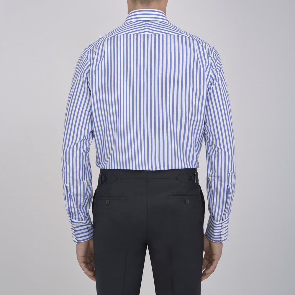 The Turnbull & Asser Blue and White Candy Stripe Shirt features a T&A collar, 3-button cuffs, and crisp white buttons, displayed neatly folded against a white background for a classic look.