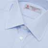 View 5 of product The Turnbull & Asser Light Blue Fine Check Shirt for men features a T&A collar, 3-button cuffs, classic white buttons, and a refined check design with a visible label inside the collar.