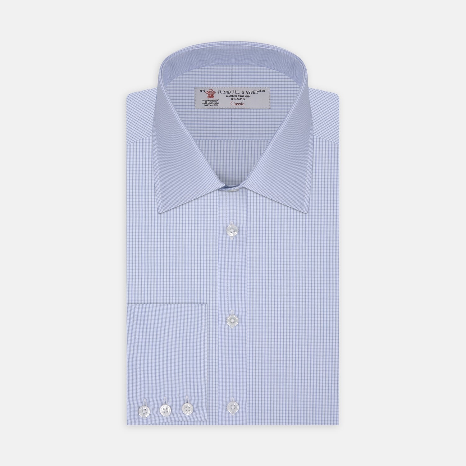 View 1 of product The Turnbull & Asser Light Blue Fine Check Shirt for men features a T&A collar, 3-button cuffs, classic white buttons, and a refined check design with a visible label inside the collar.