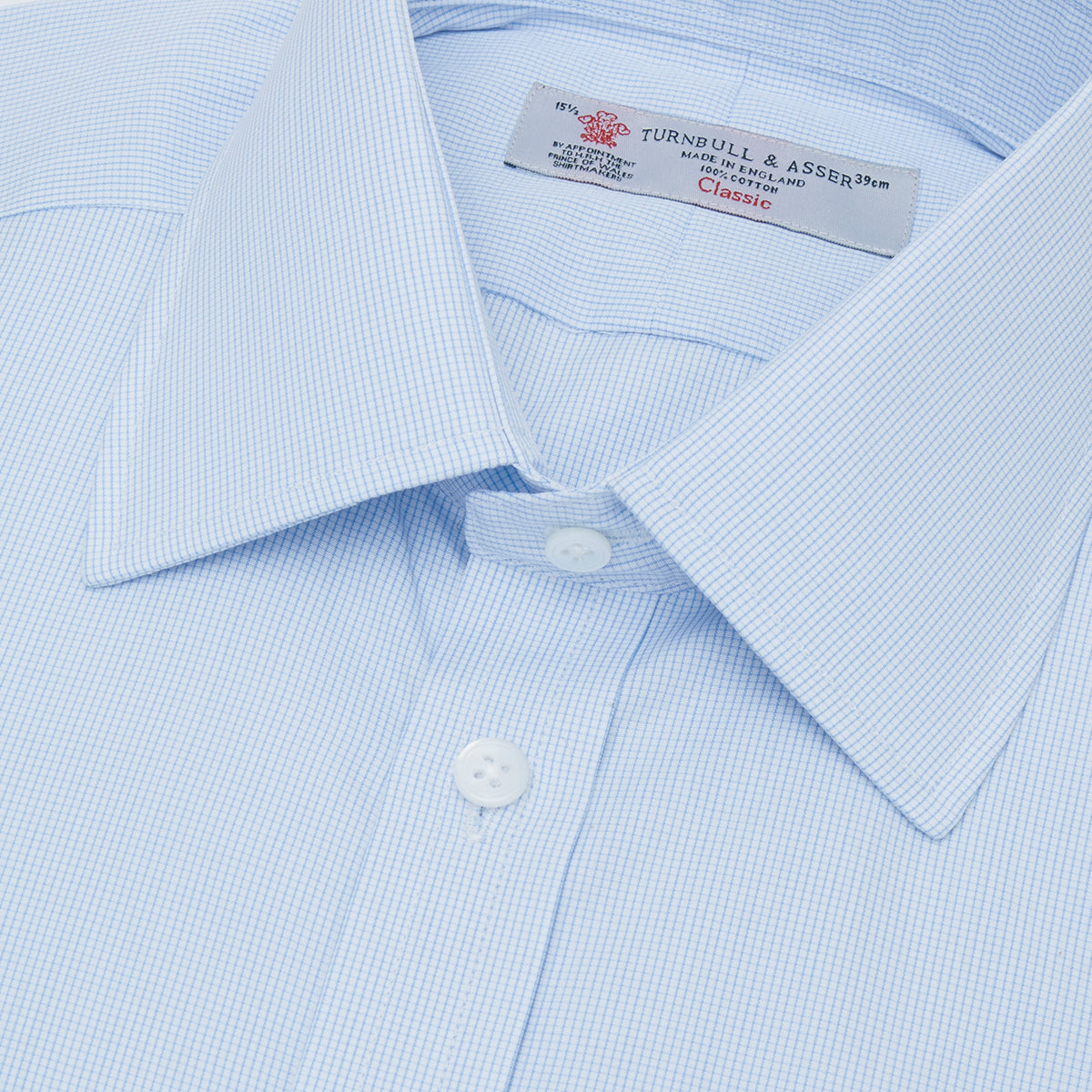 View 5 of product Turnbull & Asser’s Light Blue Fine Check Shirt features a T&A collar, double cuffs, and a subtle checked cotton pattern, neatly displayed on a white background for a classic smart look.