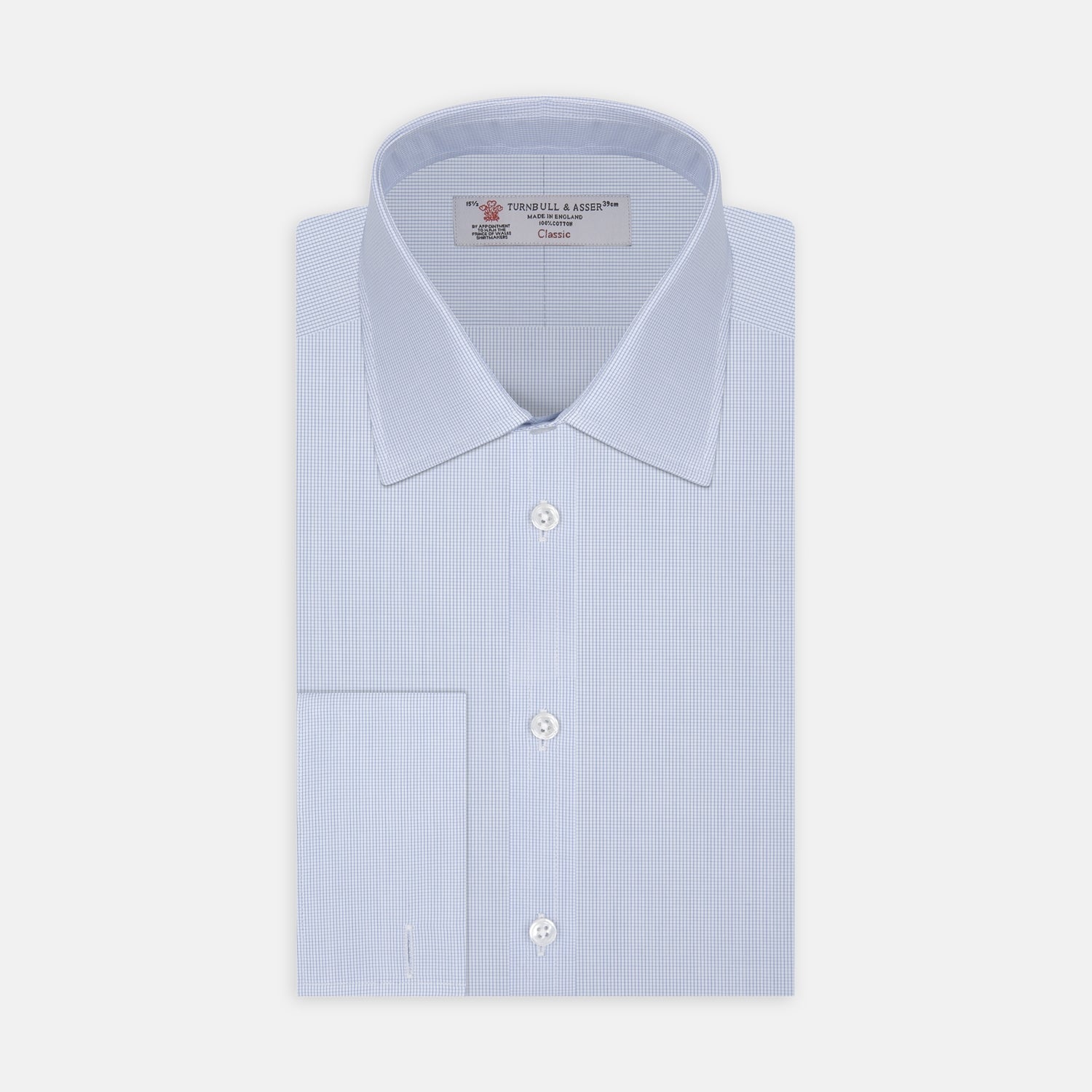 View 1 of product Turnbull & Asser’s Light Blue Fine Check Shirt features a T&A collar, double cuffs, and a subtle checked cotton pattern, neatly displayed on a white background for a classic smart look.