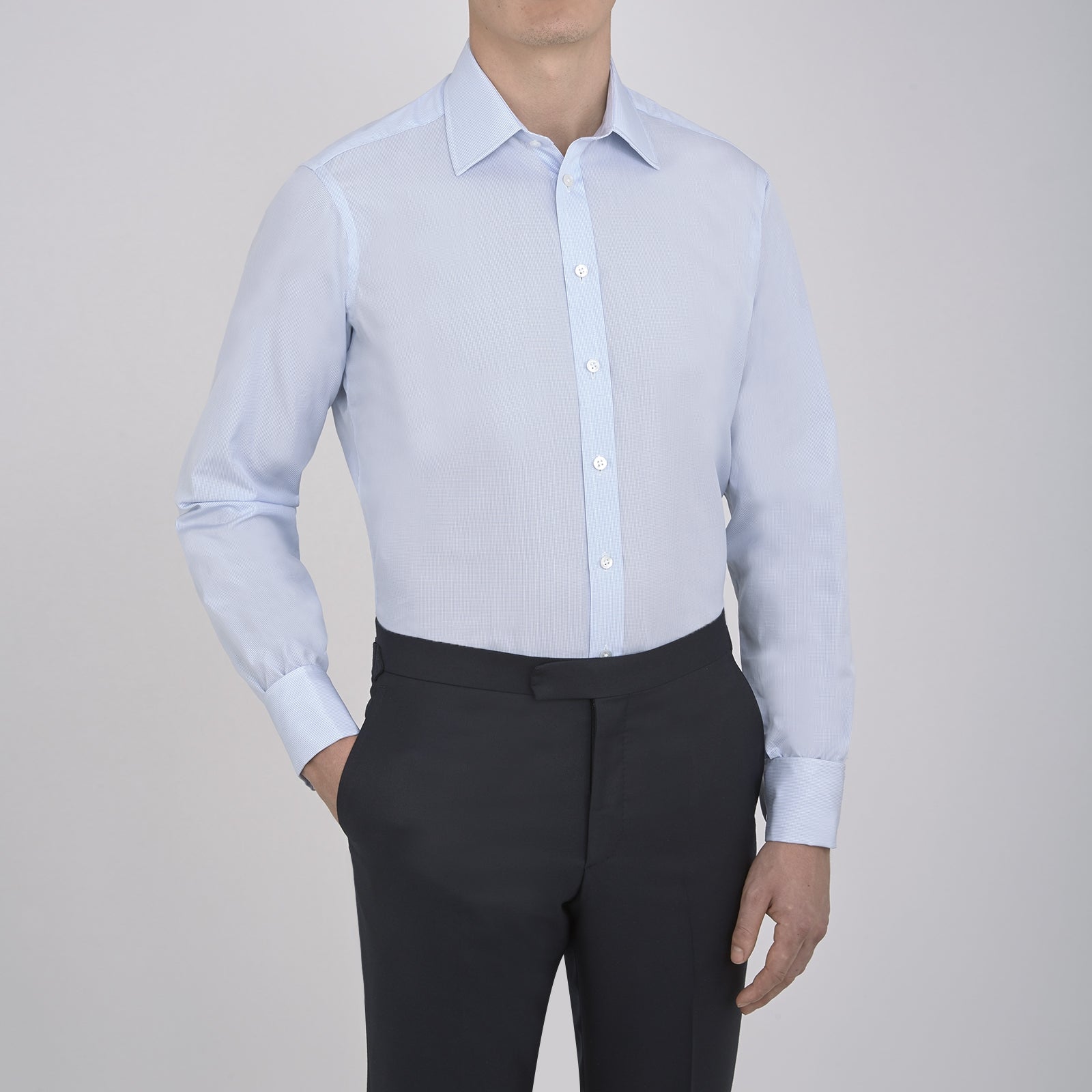 View 2 of product Turnbull & Asser’s Light Blue Fine Check Shirt features a T&A collar, double cuffs, and a subtle checked cotton pattern, neatly displayed on a white background for a classic smart look.