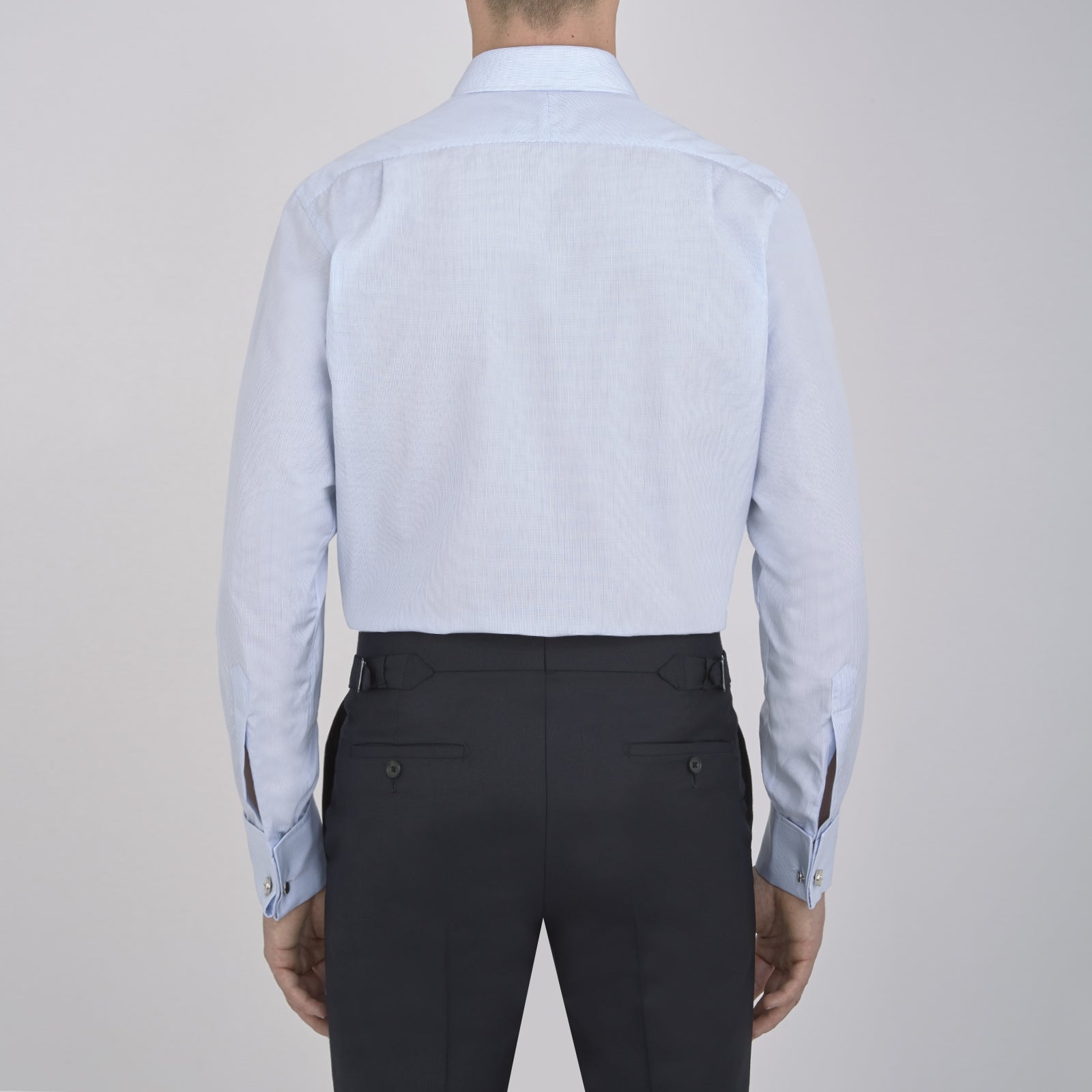 View 3 of product Turnbull & Asser’s Light Blue Fine Check Shirt features a T&A collar, double cuffs, and a subtle checked cotton pattern, neatly displayed on a white background for a classic smart look.