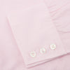 View 6 of product The Turnbull & Asser Pink Fine Check Shirt features a T&A collar, 3-button cuffs, and a subtle pink check design, made from fine cotton. Displayed neatly folded against a plain backdrop.