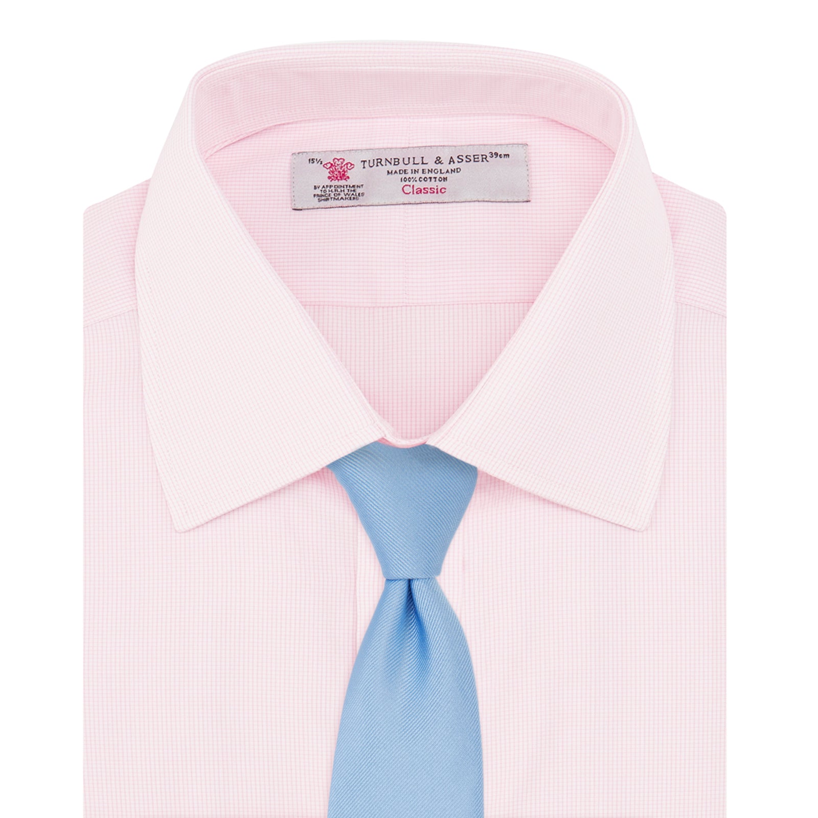 View 4 of product The Turnbull & Asser Pink Fine Check Shirt features a T&A collar, 3-button cuffs, and a subtle pink check design, made from fine cotton. Displayed neatly folded against a plain backdrop.