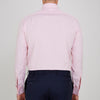 View 3 of product The Turnbull & Asser Pink Fine Check Shirt features a T&A collar, double cuffs, and classic white buttons, neatly folded and displayed against a plain white background.