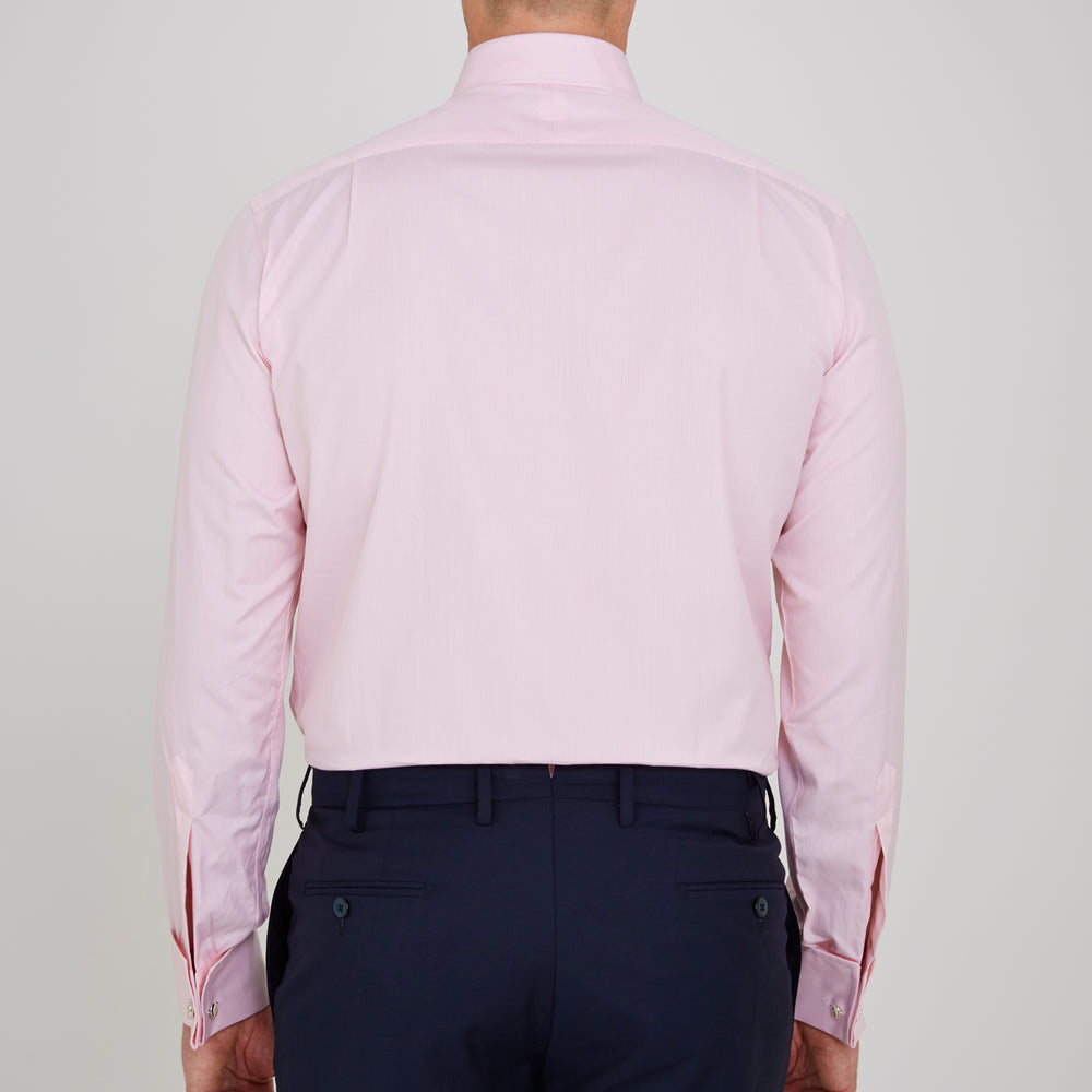 The Turnbull & Asser Pink Fine Check Shirt features a T&A collar, double cuffs, and classic white buttons, neatly folded and displayed against a plain white background.