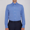 View 2 of product The Turnbull & Asser Dark Blue End-On-End Shirt features a T&A collar and 3-button cuffs, displayed neatly folded on a white background. Ideal for pairing with a navy suit, the label inside the collar is visible.